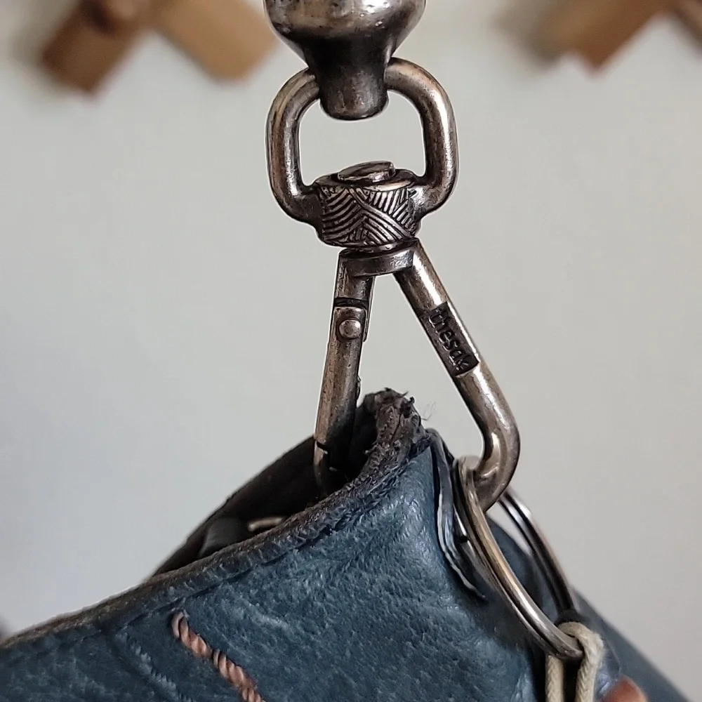 The Sak Navy Blue Leather Hobo with Brown Braided Strap